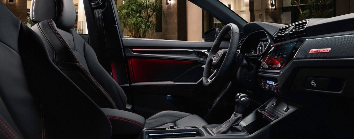 Black interior with red accents in a 2025 Audi Q3.